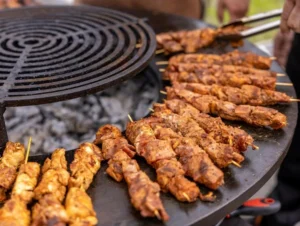Cleaning the grates of an outdoor barbecue grill